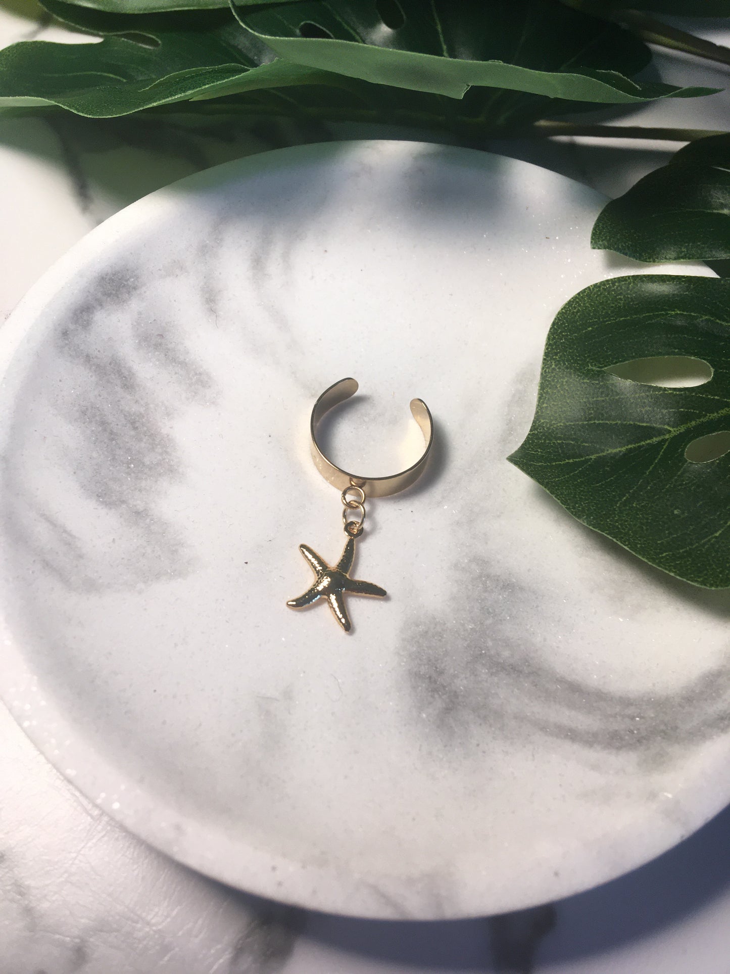 Étoile de mer | Bague breloque en acier inoxydable (dorée)